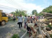 Polsek Lembar Pastikan Kegiatan Warga Aman dan Tertib di Jalur Utama