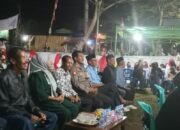 Bhabinkamtibmas Bunga Eja Amankan Perayaan HUT Desa ke-15, Warga Diimbau Kunci Ganda Kendaraan