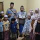 Sambut Hari Bhayangkara ke-80, Polsek Buer Salurkan Bantuan Al-Qur’an ke Rumah Mengaji